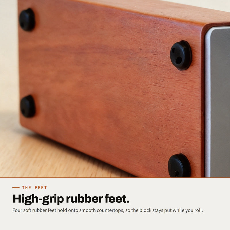 Underside of the angle block showing four rubber feet